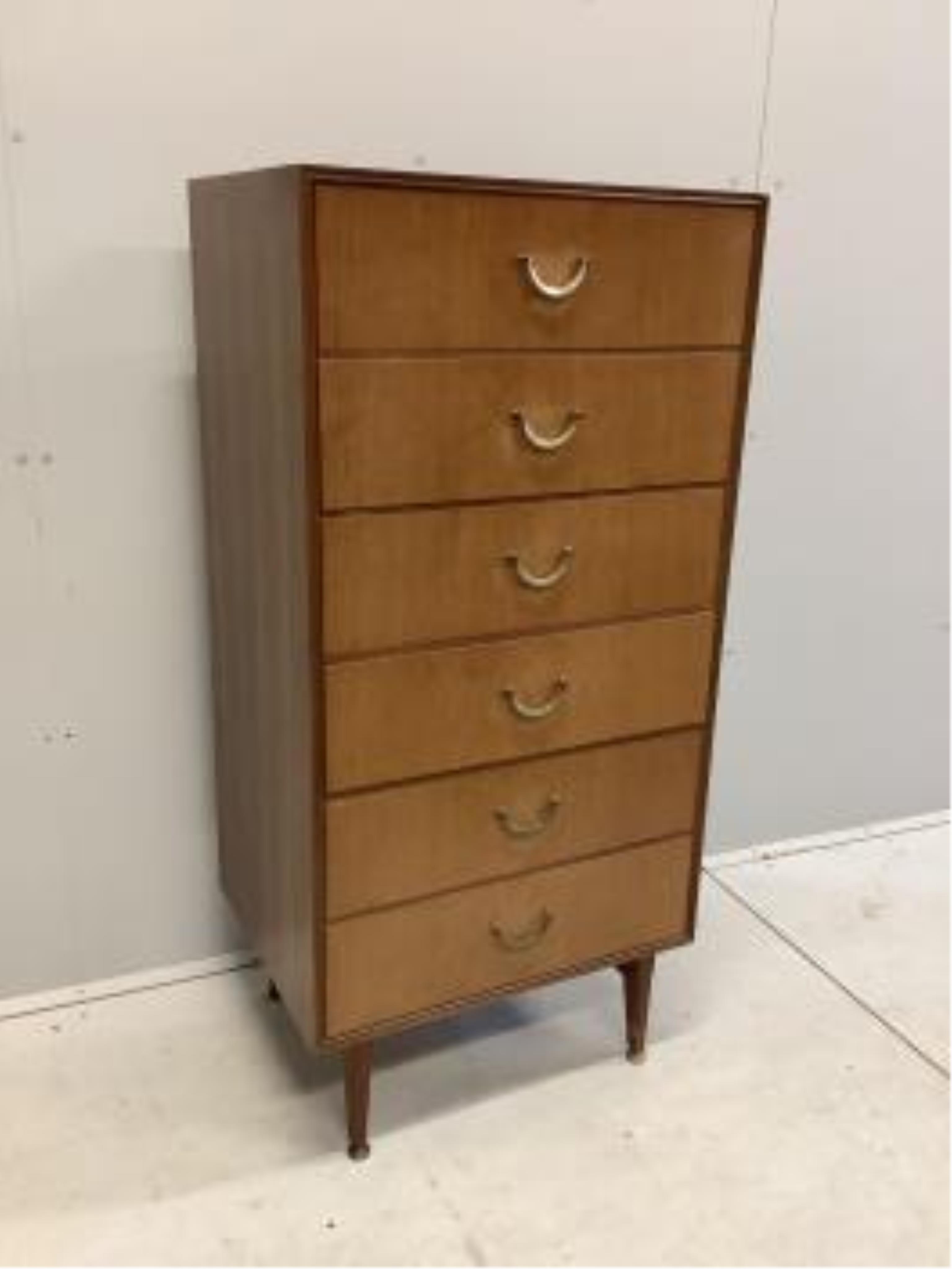 A mid century Meredew teak concave dressing table, width 162cm, depth 54cm, height 126cm, together with a stool and six drawer chest. Condition - poor to fair